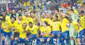  ?? (AP Photo) ?? Brazil's Neymar holds the trophy as he celebrates with his teammates after the friendly soccer match between Brazil and Argentina at King Abdullah stadium in Jeddah, Saudi Arabia, Tuesday, October 16, 2018. Brazil won 1-0.