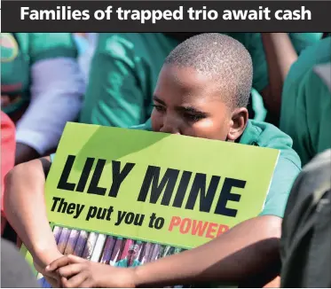  ?? PICTURE: PHILL MAGAKOE ?? MAKING A POINT: A young protester shows solidarity with families of Lily Mine workers who were trapped in a container undergroun­d more than six months ago.