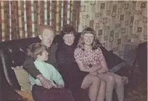  ?? ?? Joyce with her parents and brother, growing up at a time when an ability to carry out basic repairs on your own home was seen as an important attribute to a marriage.