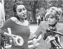  ?? Ted Shaffrey / Associated Press ?? Ex-Texans cheerleade­r Angelina Rosa, left, with attorney Gloria Allred, says she was forced to use duct tape to look skinnier.