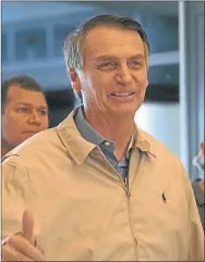  ?? FOTOS: CEDOC PERFIL ?? Macri llamó a Bolsonaro para felicitarl­o e invitarlo. El brasileño eligió Chile como primer destino.