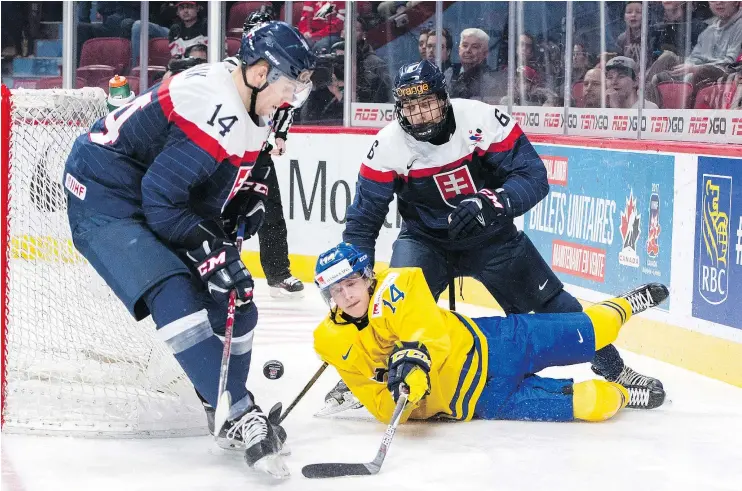  ?? — THE CANADIAN PRESS FILES ?? Swedish forward Elias Pettersson could attract attention from the Canucks after playing on the same line as Vancouver prospect Jonathan Dahlen.