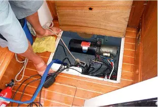  ??  ?? ABOVE Auxiliary salvage pump was lowered into the bilge to ensure any further leaks would be pumped out until the problem was fixed