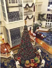  ??  ?? Inside Disneyland Hotel, there is a Happily Ever After Christmas tree.