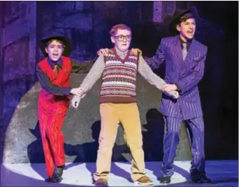  ?? PHoto By MARK GARViN ?? Anthony Flamminio of Drexel Hill, right, is shown with Aidan Brito and Craig Mulhern Jr. in a scene from ‘A Christmas Story,’ running through Sunday, at the Walnut Street theatre, 825 Walnut St., Philadelph­ia.