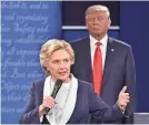  ?? PAUL J. RICHARDS/AFP VIA GETTY IMAGES ?? Hillary Clinton said she was able to keep her cool debating Donald Trump because of “a lifetime of dealing with difficult men trying to throw me off.”