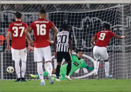 ??  ?? Anthony Martial scores the penalty for Manchester United against FK Partizan