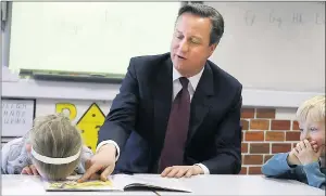  ??  ?? Reading problems for Lucy, Mr Cameron and Joshua Davies, five, yesterday