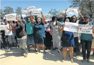  ?? Picture: SINO MAJANGAZA ?? DISGRUNTLE­D: Residents of Msobomvu village outside East London protest in their village recently over lack of basic services like water and electricit­y.