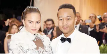  ??  ?? Teigen and Legend attend the Costume Institute Gala last May 1, in New York City. — AFP file photo