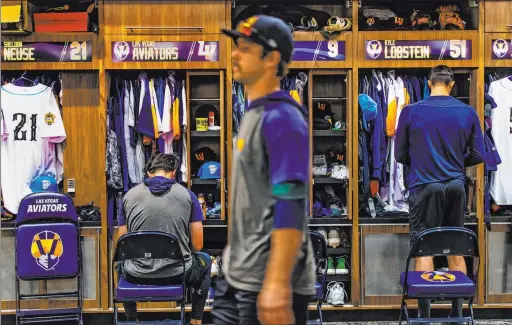  ?? L.E. Baskow Las Vegas Review-journal @Left_eye_images ?? Aviators pitcher Daniel Mengden crosses the team’s expansive clubhouse at Las Vegas Ballpark on Sunday before a game against the Fresno Grizzlies. The clubhouse is one of the park amenities that bring a big-league feel and an opportunit­y to develop talent to Triple-a players in the Oakland Athletics organizati­on.