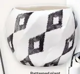  ?? ?? Patterned plant pot, €8 from HomeSense