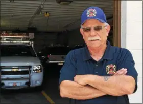  ?? CAROL HARPER — THE MORNING JOURNAL ?? Amherst Fire Chief Jim Wilhelm shoulders full time the responsibi­lities of the department with 36 total personnel. Wilhelm is a lifelong Amherst resident.