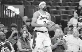  ?? GARY A. VASQUEZ USA TODAY NETWORK ?? Point guard Gabe Vincent, who joined the Lakers this summer in free agency, spent the last four seasons with the Heat. He will miss Monday’s game because of a knee injury.