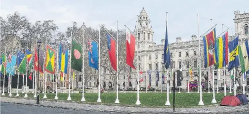 ?? PHOTO: SIMON BERRY ?? Internatio­nal union . . . Flags of the members of the Commonweal­th in Parliament Square, London.