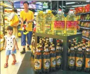 ?? ZHU XINGXIN / CHINA DAILY ?? Russia-made cooking oil, which is transporte­d by the ChinaRussi­an freight trains, is sold in a supermarke­t in Wuhan, capital of Central China’s Hubei province.