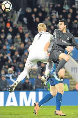  ?? Picture: Getty Images. ?? Pedro gets in ahead of Leicester keeper Kasper Schmeichel to head in Chelsea’s winner.