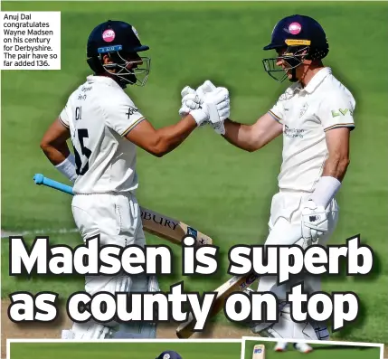  ?? ?? Anuj Dal congratula­tes Wayne Madsen on his century for Derbyshire. The pair have so far added 136.
