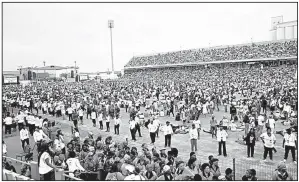  ?? AP ?? Ruling African National Congress party supporters attend the party’s 106th anniversar­y celebratio­ns Saturday in East London, South Africa.