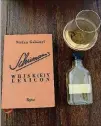  ?? ANGELA HANSBERGER FOR THE ATLANTA JOURNAL-CONSTITUTI­ON ?? Stefan Gabanyi’s whiskey compendium is as thorough a lexicon as it is elegantly handsome.