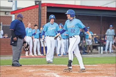  ?? Steven Eckhoff ?? Model’s Jace Armstrong smiles as he crosses home plate after his two-run homer during Tuesday’s game at Pepperell.