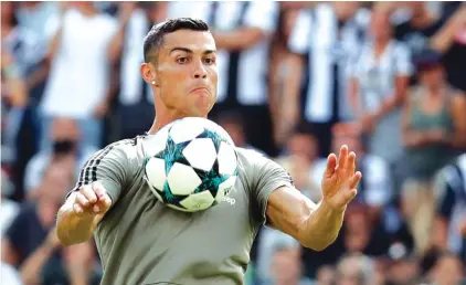  ??  ?? Cristiano Ronaldo controls the ball during a friendly match between the Juventus A and B teams on Sunday Photo: AP