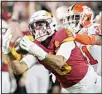  ?? (AP) ?? Iowa State wide receiver Xavier Hutchinson (8) catches a 34-yard pass in front of Clemson cornerback Mario Goodrich (31) during the first half of the Cheez-It Bowl NCAA college football game, on Dec 29, in Orlando, Florida.