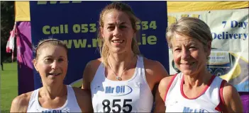  ??  ?? The top three in the county ladies’ Senior cross-country (from left): Jackie Carthy (Kilmore, third), Fiona Kehoe (Kilmore, first), Ann Sullivan (D.M.P., third).