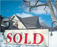  ?? GRAEME ROY THE CANADIAN PRESS FILE PHOTO ?? Brokerage Zoocasa estimates that the areas in greater Toronto that set new records in home prices in August were farthest from the city centre, such as Ajax, New Tecumseth and Whitby.