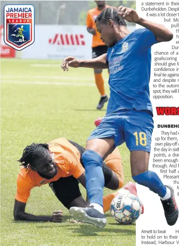  ?? IAN ALLEN ?? Devroy Grey (left) of Tivoli Gardens goes down after a tackle by Oniel Small (right) of Molynes United during their Jamaica Premier League match at the UWI-JFF Captain Horace Burrell Centre of Excellence last Saturday. The match ended 1-1.