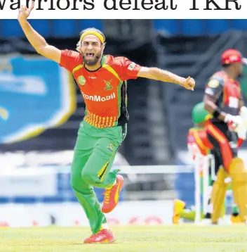  ?? RANDY BROOKS - CPL T20 ?? Imran Tahir (left) of Guyana Amazon Warriors celebrates the dismissal of Darren Bravo of Trinbago Knight Riders during their Hero Caribbean Premier League match at Warner Park in Basseterre, Saint Kitts and Nevis, yesterday.