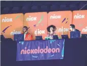  ?? TYLER KAUFMAN AP ?? Nate Burleson, Gabrielle Nevaeh Green and Noah Eagle (from left) did the NFL game for Nickelodeo­n.