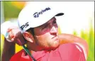  ?? Dante Carrer) (AP Photo/ ?? Spain's Jon Rahm hits from the fourth tee during the last round of the Hero World Challenge at Albany Golf Club in Nassau, Bahamas, Sunday, Dec. 2, 2018.