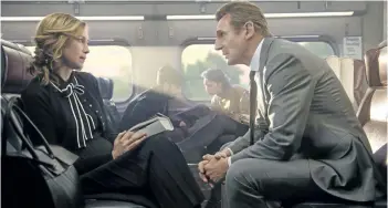  ?? JAY MAIDMENT/LIONSGATE ?? Vera Farmiga, left, and Liam Neeson in The Commuter.