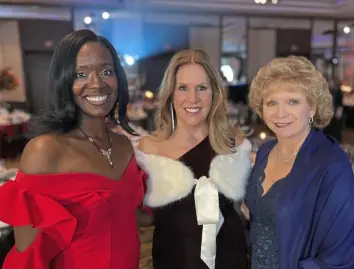  ?? Patricia Sheridan/Post-Gazette photos ?? Ball committee members Melonie Nance, left, Christina O'Toole and Betsy Teti at Pittsburgh Ballet Theatre's Pointe in Time ball Saturday at the Westin Convention Center in Downtown.