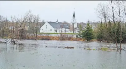  ?? GREG MCNEIL/CAPE BRETON POST ?? St. Marguerite Bourgeoys Catholic Church was devastated by Thanksgivi­ng floods. Though waters rose around the Sydney church over the past week they were not close to the church on Thursday.