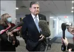  ?? ?? Manchin: Still thinking...