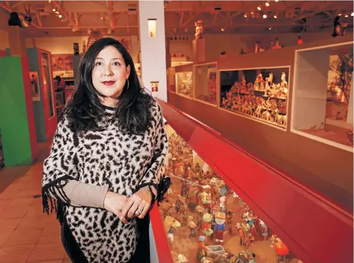  ?? photo Luis Sánchez Saturno/The New Mexican ?? Jennifer Villela inside the Girard Wing of the Museum of Internatio­nal Folk Art,