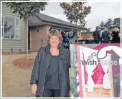  ??  ?? Chipping in: Elaine Morley of GJ Gardner Homes, which helped with the building of the Wish House.