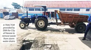  ??  ?? A TRACTOR provided by EMA for City of Harare to remove waste from storm water drains