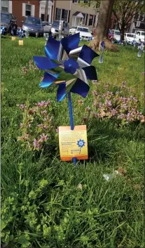  ?? ALEX ROSE - MEDIANEWS GROUP ?? Pinwheels representi­ng families served by the Family Support Line were planted in front of the county courthouse on Wednesday.