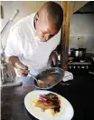  ?? AYANDA NDAMANE African News Agency (ANA) ?? NTLALO Jordan is a chef with a passion for fine cuisine. |