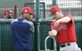  ?? BOSTON HERALD FILE; LEFT, AP ?? Red Sox hitting coach Tim Hyers, right, instructs Mookie Betts during spring training in 2019. Hyers declined a contract on Monday to return to the team. Meanwhile, the family of late Red Sox legend Jerry Remy, at left, released a statement yesterday thanking Red Sox Nation for its support.