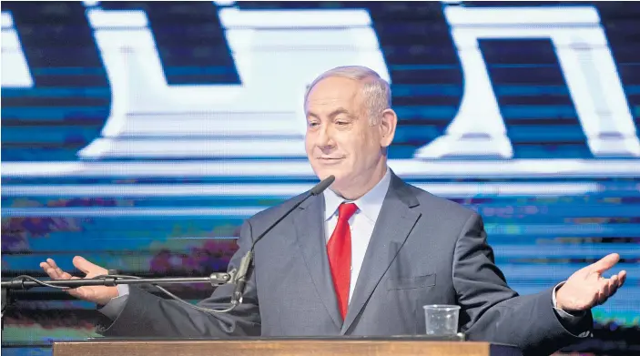  ??  ?? COMBATIVE ATTITUDE: Israel’s Prime Minister Benjamin Netanyahu speaks at his Likud Party conference in Tel Aviv. Mr Netanyahu is increasing­ly sounding like his friend, President Donald Trump.