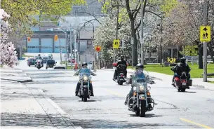  ?? CATHIE COWARD THE HAMILTON SPECTATOR ?? Motorcycli­sts make their way up Sydenham Road in Dundas and out into the Flamboroug­h countrysid­e for a ride on Sunday.