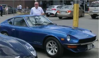  ??  ?? Scott Davidson is offering a $10,000 reward for informatio­n on his missing 1972 Datsun 240Z.