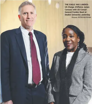  ?? Picture: PETER RISTEVSKI ?? THE EAGLE HAS LANDED: US Charge d'Affaires James Carouso with US ConsulGene­ral Frankie Reed at Deakin University yesterday.