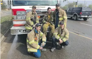  ??  ?? In Damian Asher’s new book, he recounts the harrowing details of the work firefighte­rs did a year ago to battle the wildfires threatenin­g Fort McMurray.