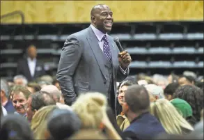  ?? Scott Strazzante / The Chronicle ?? Magic Johnson discusses the “Business of Basketball” in a talk moderated by the Golden State Warriors’ Rick Welts in October 2017 in San Francisco.