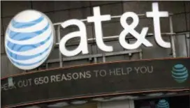  ?? MARK LENNIHAN — THE ASSOCIATED PRESS FILE ?? The government and AT&T exchanged opening salvos in a federal trial Thursday as the U.S. seeks to block the telephone giant from absorbing Time Warner, in a case that could shape how consumers get — and how much they pay for — streaming TV and movies.